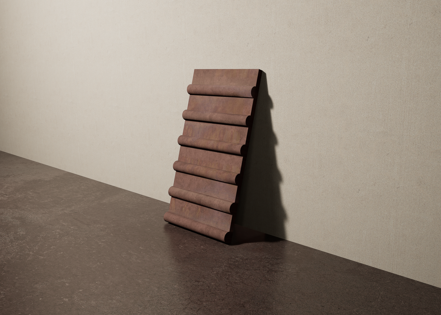 a 8"x15" bespoke concrete tile with six rounded ribs leans against a textured, plaster wall on an unfinished concrete floor